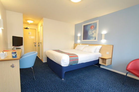 Travelodge Уиднес Номер фото